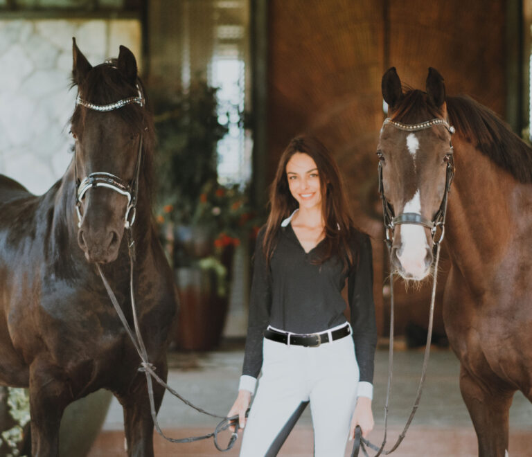 Woman with horses.